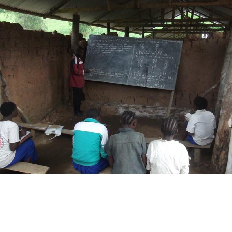 A teacher and his pupils at Bikaniro Primary School